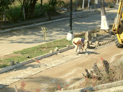 Laying Interlocked Road Stones.